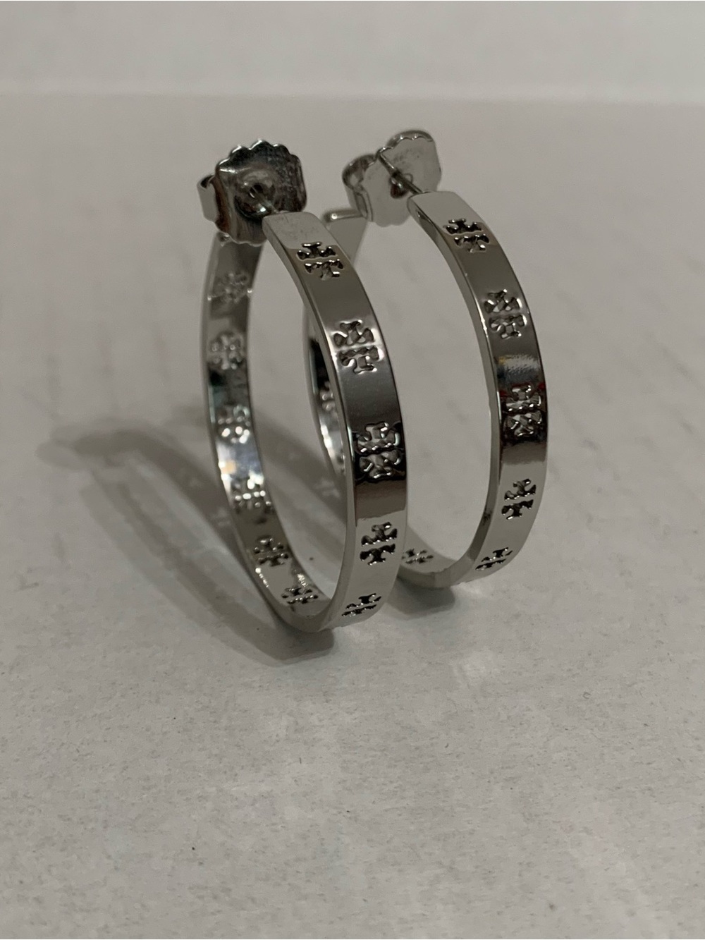 Tory Burch logo Silver tone hoop earrings